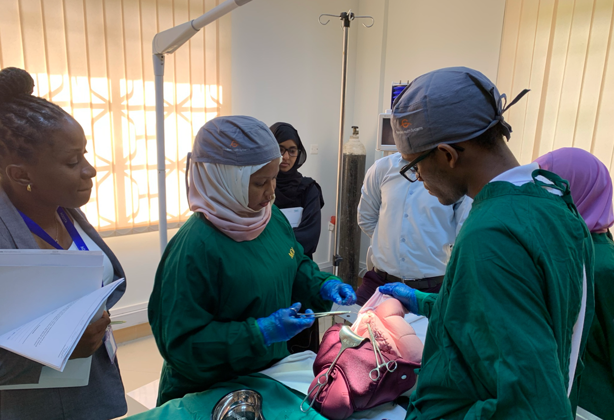 A surgical team practices with Laerdal Global Health training devices
