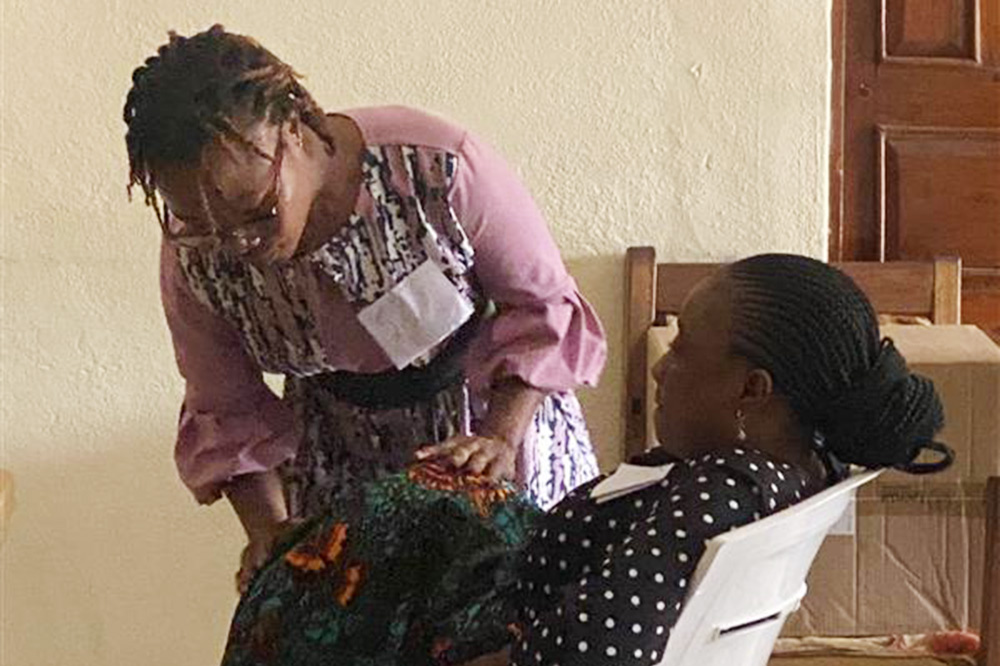 Midwives in Sierra Leone train with a Laerdal Global Health simulator
